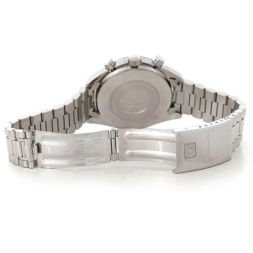 The image shows the back view of an Omega Speedmaster 3510.50.00 Men
s Stainless Steel Black Dial 3510.50.00 Men
s Stainless Steel Black Dial watch, highlighting the case back and open clasp of the metal bracelet.