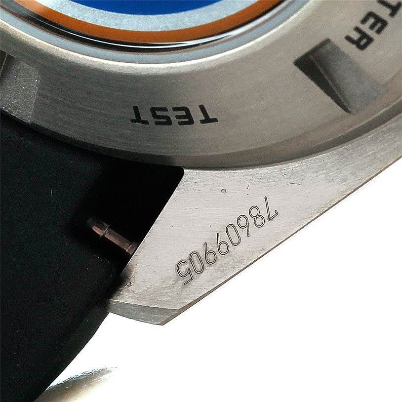 This image shows a close-up of the Omega Speedmaster 321.92.44.52.01.001 Men
s Titanium Black Dial 321.92.44.52.01.001 Men
s Titanium Black Dial case back, featuring part of the model name and serial number.