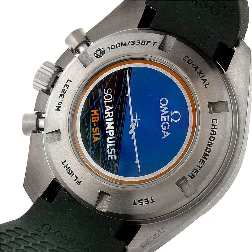 The image shows the back case of the Omega Speedmaster 321.92.44.52.01.001 Men
s Titanium Black Dial 321.92.44.52.01.001 Men
s Titanium Black Dial, highlighting its "Solar Impulse" design and water resistance.