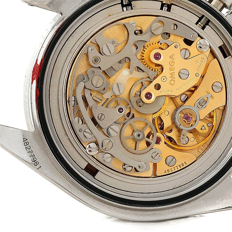 The image shows the intricate mechanical movement of an Omega Speedmaster 3590.50.00 Men
s Stainless Steel Black Dial 3590.50.00 Men
s Stainless Steel Black Dial watch from a direct back angle.