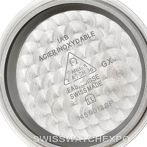 The image shows the inner side of the case back of an Omega Speedmaster Men
s Stainless Steel Black Dial Men
s Stainless Steel Black Dial, displaying engraved text and trademarks.