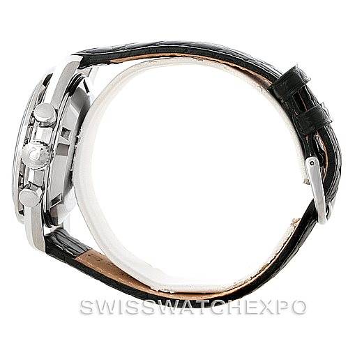 The image shows a side view of the Omega Speedmaster Men
s Stainless Steel Black Dial Men
s Stainless Steel Black Dial watch, displaying its crown, pushers, and leather strap.