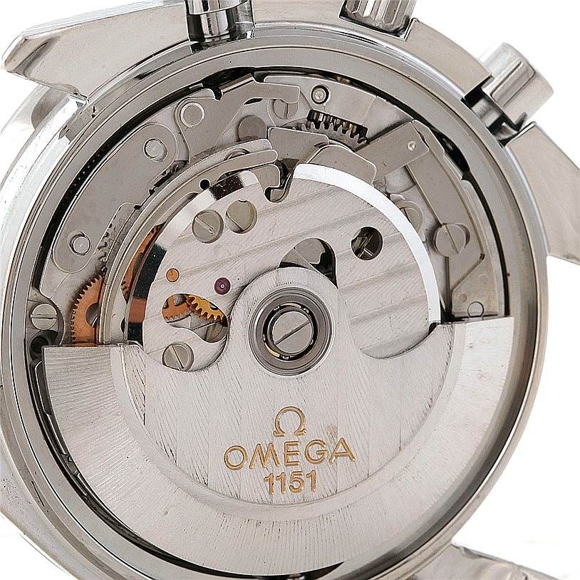 The image shows the back view of the Omega Speedmaster 3523.80.00 Men
s Stainless Steel Blue Dial 3523.80.00 Men
s Stainless Steel Blue Dial watch, highlighting its internal mechanical movement components.