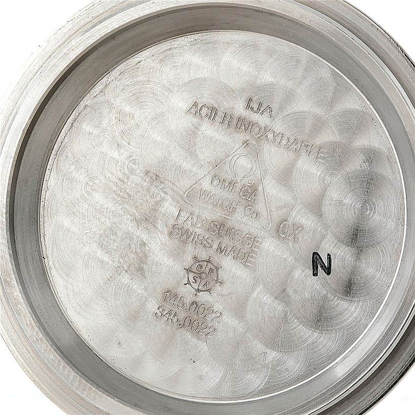 The image shows the inside case back of an Omega Speedmaster Men
s Stainless Steel Black Dial Men
s Stainless Steel Black Dial watch.