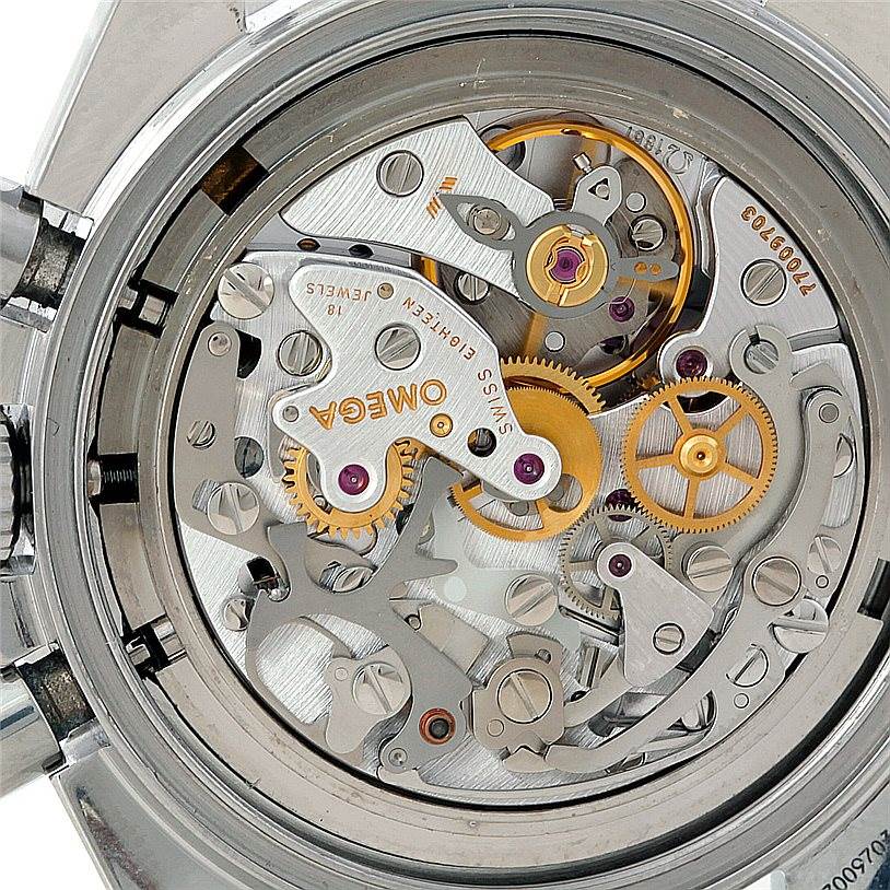 This image shows the intricate inner mechanics of an Omega Speedmaster 3560.50.00 Men
s Stainless Steel Black Dial 3560.50.00 Men
s Stainless Steel Black Dial watch movement at a close-up angle.