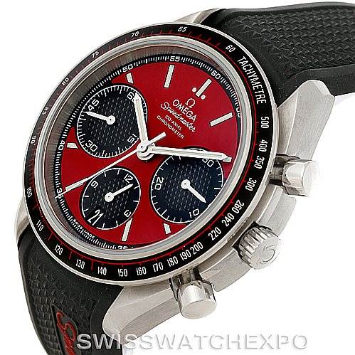 The image shows a side angle of the Omega Speedmaster 326.32.40.50.11.001 Men's Stainless Steel Red Dial 326.32.40.50.11.001 Men's Stainless Steel Red Dial watch, highlighting its red dial, tachymeter bezel, and black textured strap.