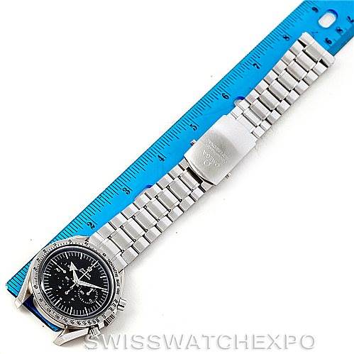 The image shows an Omega Speedmaster 3594.50.00 Men
s Stainless Steel Black Dial 3594.50.00 Men
s Stainless Steel Black Dial watch laid flat next to a blue ruler, displaying the bracelet and face clearly.