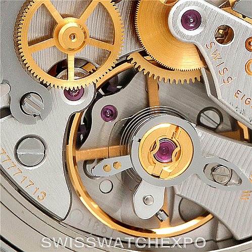 This close-up image shows the intricate movement and gears of the Omega Speedmaster 3570.50.00 Men
s Stainless Steel Black Dial 3570.50.00 Men
s Stainless Steel Black Dial watch.