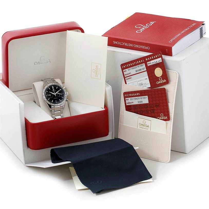 This image shows an Omega Speedmaster 331.10.42.51.01.001 Men
s Stainless Steel Black Dial 331.10.42.51.01.001 Men
s Stainless Steel Black Dial watch with its box, operating instructions, warranty cards, and a cleaning cloth.