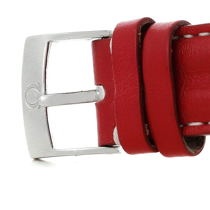 The image shows a close-up of the red leather strap and metal buckle of an Omega Speedmaster 3521.30.00 Men
s Stainless Steel White Dial 3521.30.00 Men
s Stainless Steel White Dial watch.
