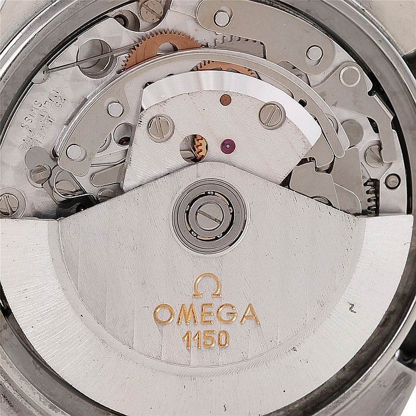 The image shows the internal mechanics and rotor of the Omega Speedmaster 3521.30.00 Men
s Stainless Steel White Dial 3521.30.00 Men
s Stainless Steel White Dial 1150 movement.