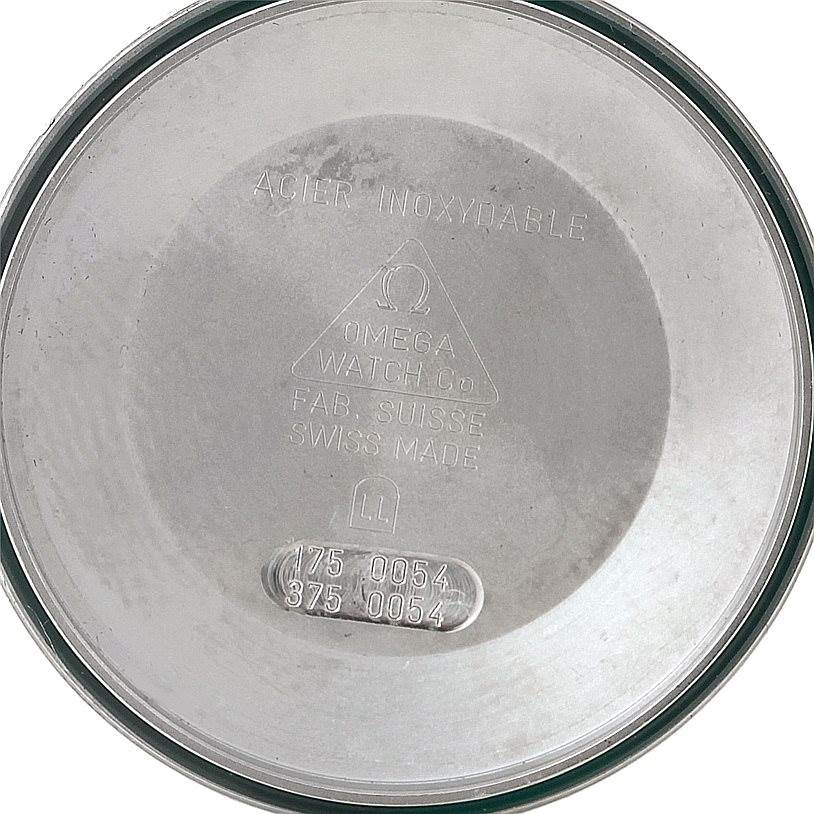 This image shows the inside case back of an Omega Speedmaster 3521.30.00 Men
s Stainless Steel White Dial 3521.30.00 Men
s Stainless Steel White Dial watch, revealing the model number and "Acier Inoxydable" labeling.