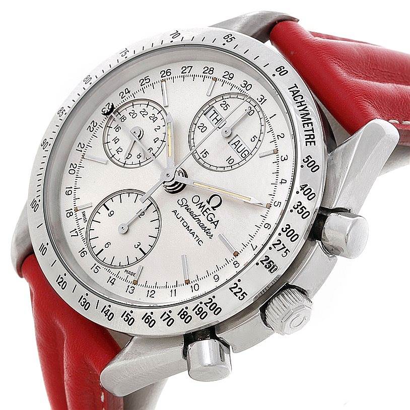 The Omega Speedmaster 3521.30.00 Men
s Stainless Steel White Dial 3521.30.00 Men
s Stainless Steel White Dial watch is shown at an angled close-up, highlighting the face, crown, chronograph pushers, and red strap.
