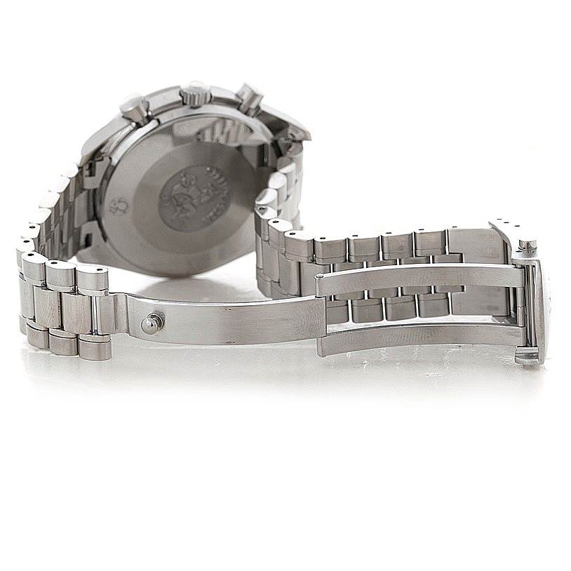 The image shows the back view of an Omega Speedmaster 3539.50.00 Men
s Stainless Steel Black Dial 3539.50.00 Men
s Stainless Steel Black Dial watch and its opened metal bracelet clasp.