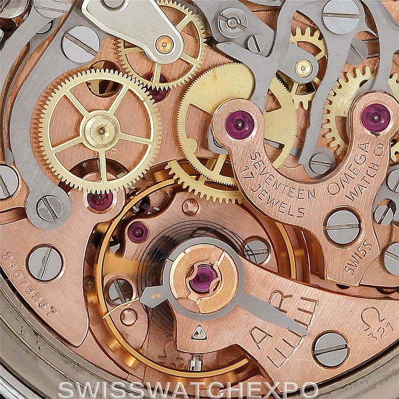 This image shows a close-up of the internal mechanical movement of the Omega Speedmaster Men
s Stainless Steel Black Dial Men
s Stainless Steel Black Dial watch, highlighting gears and jewels.