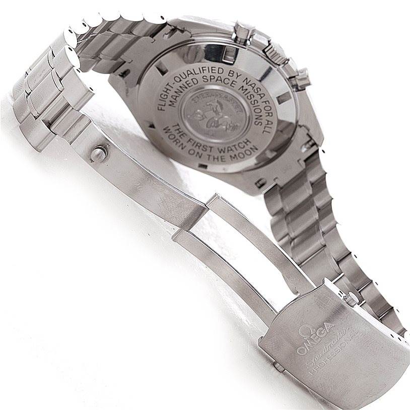 The image shows the back case, clasp, and bracelet of an Omega Speedmaster 3570.50.00 Men
s Stainless Steel Black Dial 3570.50.00 Men
s Stainless Steel Black Dial watch, emphasizing inscriptions and branding.