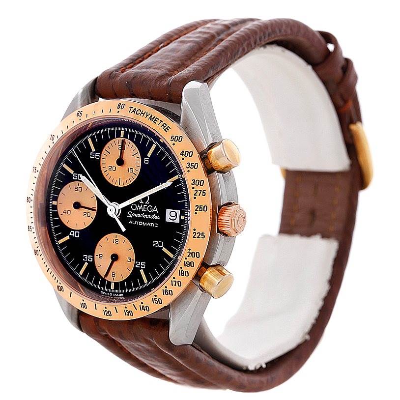 The Omega Speedmaster 3716.50.00 Men
s Stainless Steel Black Dial 3716.50.00 Men
s Stainless Steel Black Dial watch is shown at an oblique angle, highlighting its face, bezel, pushers, and brown leather strap.