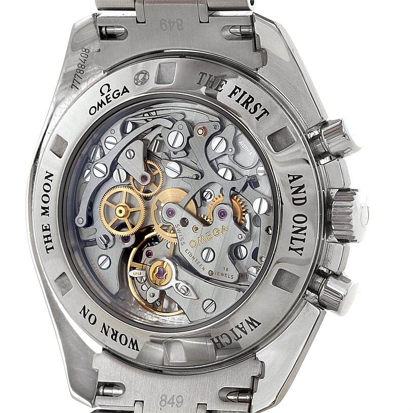 The image shows the back side of an Omega Speedmaster 311.30.42.30.13.001 Men's Stainless Steel Brown Dial 311.30.42.30.13.001 Men's Stainless Steel Brown Dial watch, highlighting its intricate movement and internal mechanics.