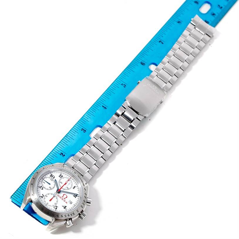 The Omega Speedmaster 323.10.40.40.04.001 Men
s Stainless Steel White Dial 323.10.40.40.04.001 Men
s Stainless Steel White Dial watch is shown from a top view with its face, metal strap, and clasp visible.