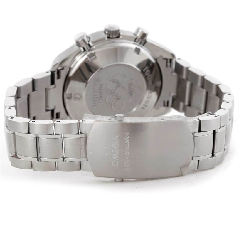 The image shows the back case and clasp of an Omega Speedmaster 323.10.40.40.04.001 Men
s Stainless Steel White Dial 323.10.40.40.04.001 Men
s Stainless Steel White Dial, highlighting the engraved logo and metal bracelet.