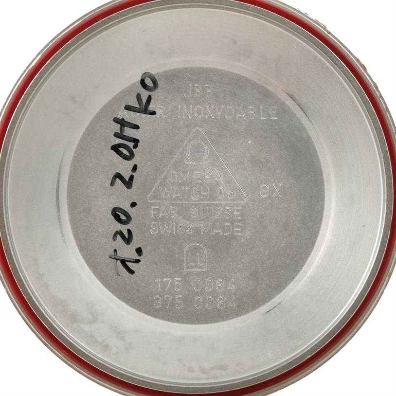 The image shows the inside of the case back of an Omega Speedmaster 3520.50.00 Men
s Stainless Steel Black Dial 3520.50.00 Men
s Stainless Steel Black Dial watch.