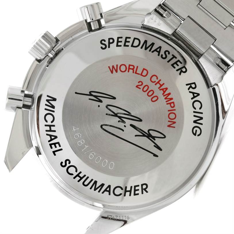 The image shows the back case of an Omega Speedmaster 3518.50.00 Men
s Stainless Steel Black Dial 3518.50.00 Men
s Stainless Steel Black Dial Racing watch, featuring commemorative engravings and a metal bracelet.