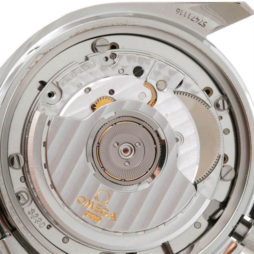 The image shows the inner mechanism and movement of an Omega Speedmaster 3518.50.00 Men
s Stainless Steel Black Dial 3518.50.00 Men
s Stainless Steel Black Dial watch from a close-up angle.