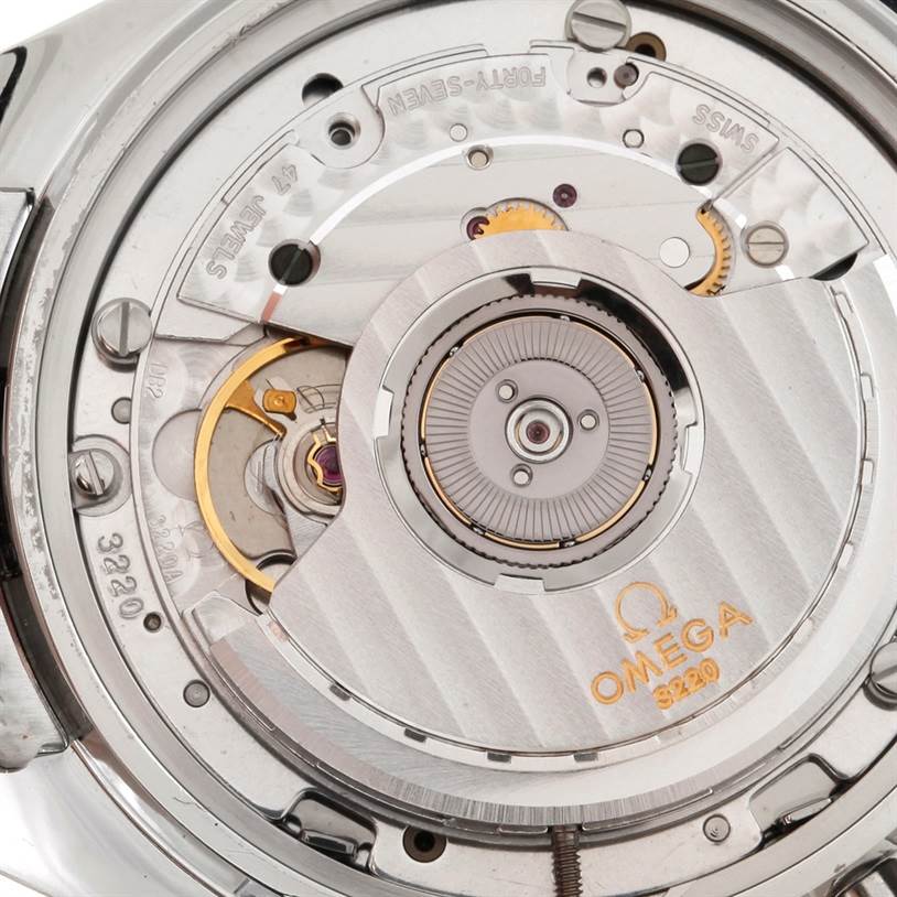 The image shows a close-up of the Omega Speedmaster 3518.50.00 Men
s Stainless Steel Black Dial 3518.50.00 Men
s Stainless Steel Black Dial
s transparent case back revealing the watch
s intricate movement.