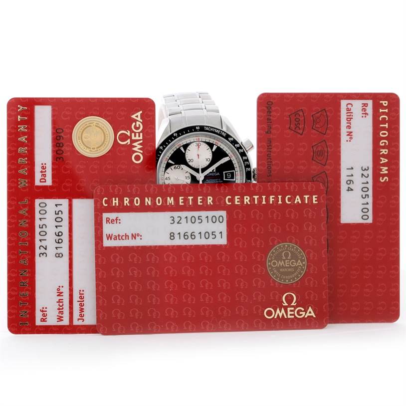 The image shows the Omega Speedmaster 3210.51.00 Men
s Stainless Steel Black Dial 3210.51.00 Men
s Stainless Steel Black Dial watch partially obscured by three warranty and certification cards.