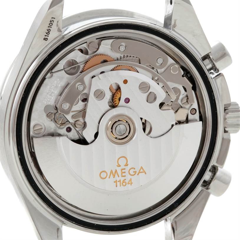 The image shows the movement and inner mechanisms of an Omega Speedmaster 3210.51.00 Men
s Stainless Steel Black Dial 3210.51.00 Men
s Stainless Steel Black Dial watch from a rear view angle.