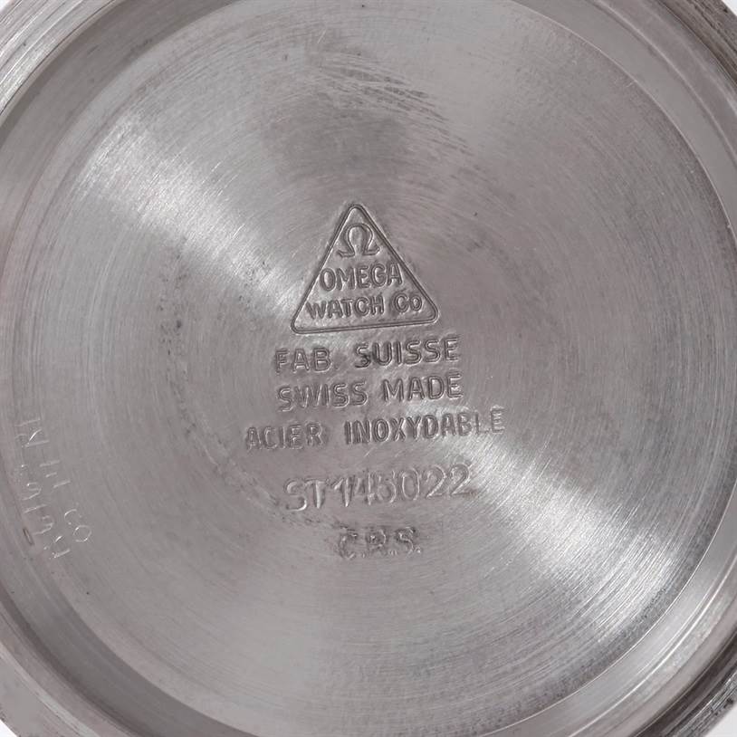 The image shows the inner side of the case back for an Omega Speedmaster Men
s Stainless Steel Black Dial Men
s Stainless Steel Black Dial watch.