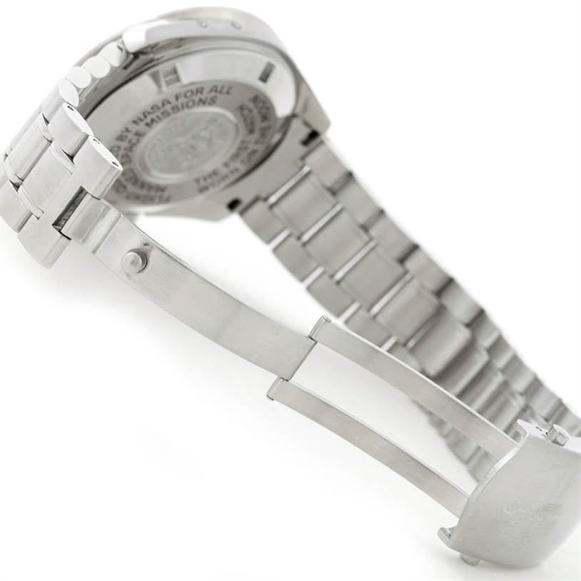 The image shows the underside of an Omega Speedmaster 3575.20.00 Men
s Stainless Steel White Dial 3575.20.00 Men
s Stainless Steel White Dial watch, focusing on the clasp and part of the bracelet.