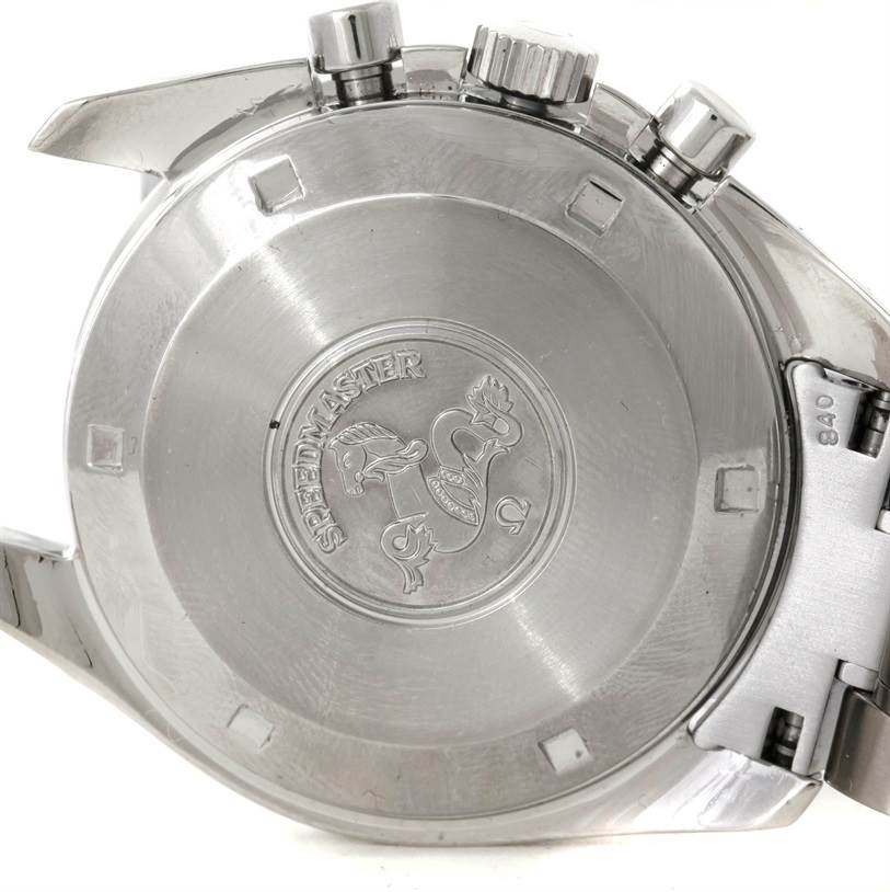 The image shows the case back and part of the bracelet clasp of an Omega Speedmaster Men
s Stainless Steel Black Dial Men
s Stainless Steel Black Dial watch.