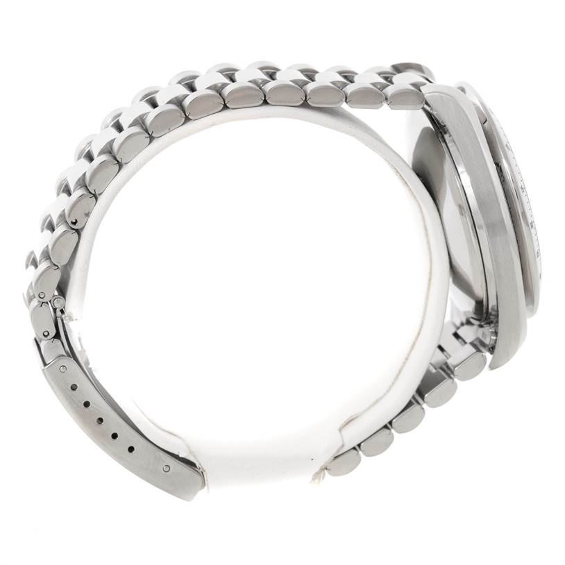 The image shows a side view of the Omega Speedmaster 3513.80.00 Men
s Stainless Steel Blue Dial 3513.80.00 Men
s Stainless Steel Blue Dial watch, focusing on the stainless steel bracelet and clasp.