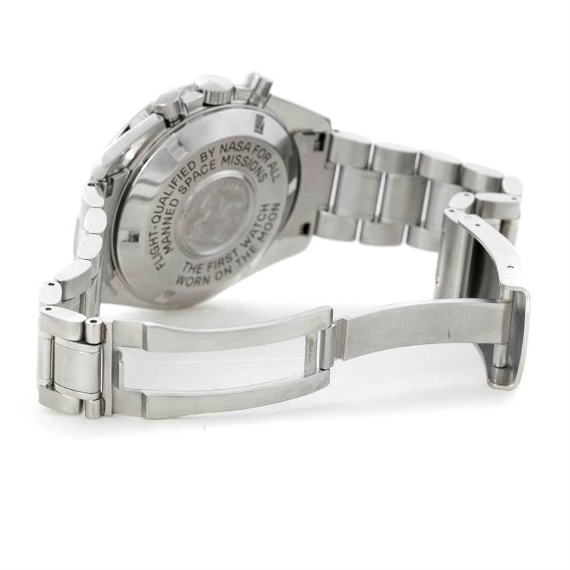 The image shows the back case and partially open bracelet clasp of an Omega Speedmaster 3570.50.00 Men
s Stainless Steel Black Dial 3570.50.00 Men
s Stainless Steel Black Dial watch from a rear angle.