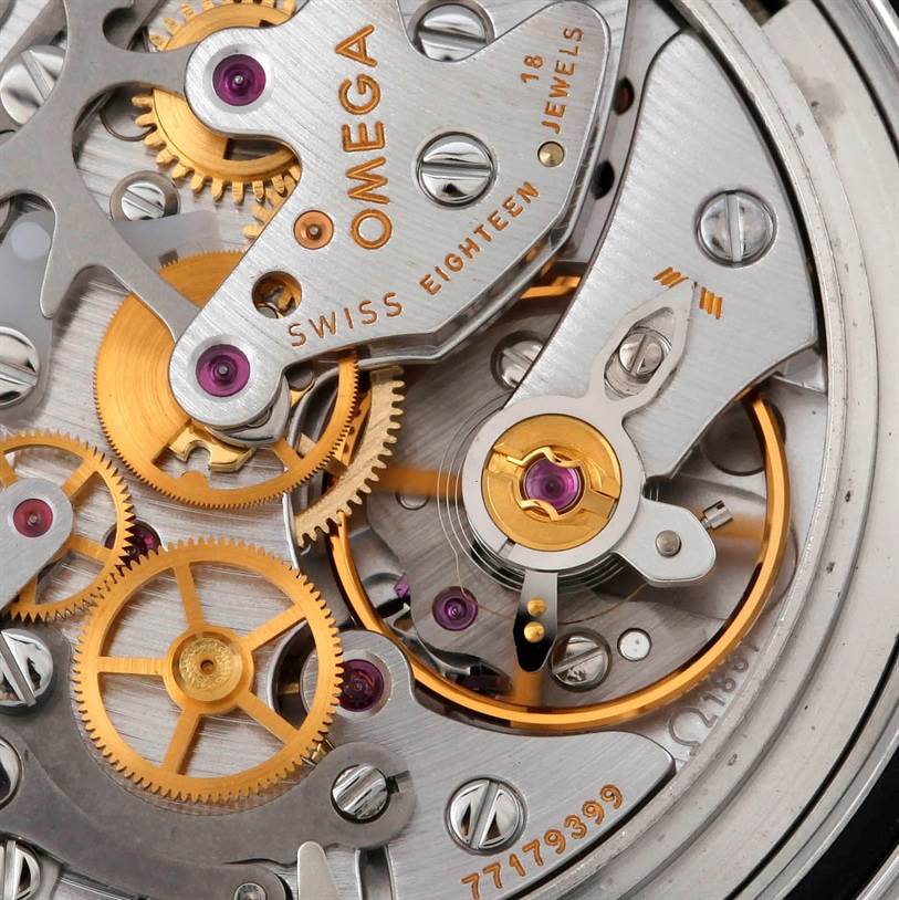 Close-up view of the Omega Speedmaster 3570.50.00 Men
s Stainless Steel Black Dial 3570.50.00 Men
s Stainless Steel Black Dial watch movement, showcasing gears, jewels, and intricate mechanical components.