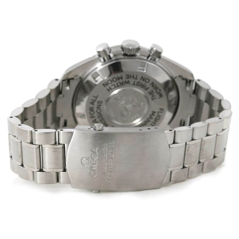 The image shows the back and clasp of an Omega Speedmaster 3570.50.00 Men
s Stainless Steel Black Dial 3570.50.00 Men
s Stainless Steel Black Dial watch, highlighting the bracelet and case back.