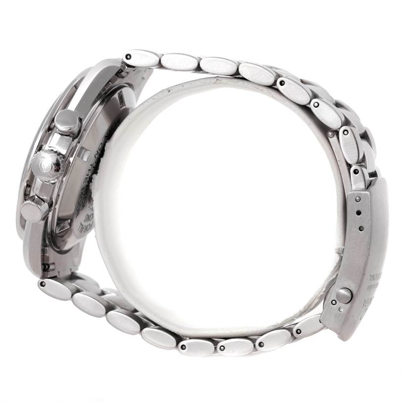 The image shows a side view of the Omega Speedmaster 3570.50.00 Men
s Stainless Steel Black Dial 3570.50.00 Men
s Stainless Steel Black Dial watch, focusing on its metallic bracelet and crown/pushers.