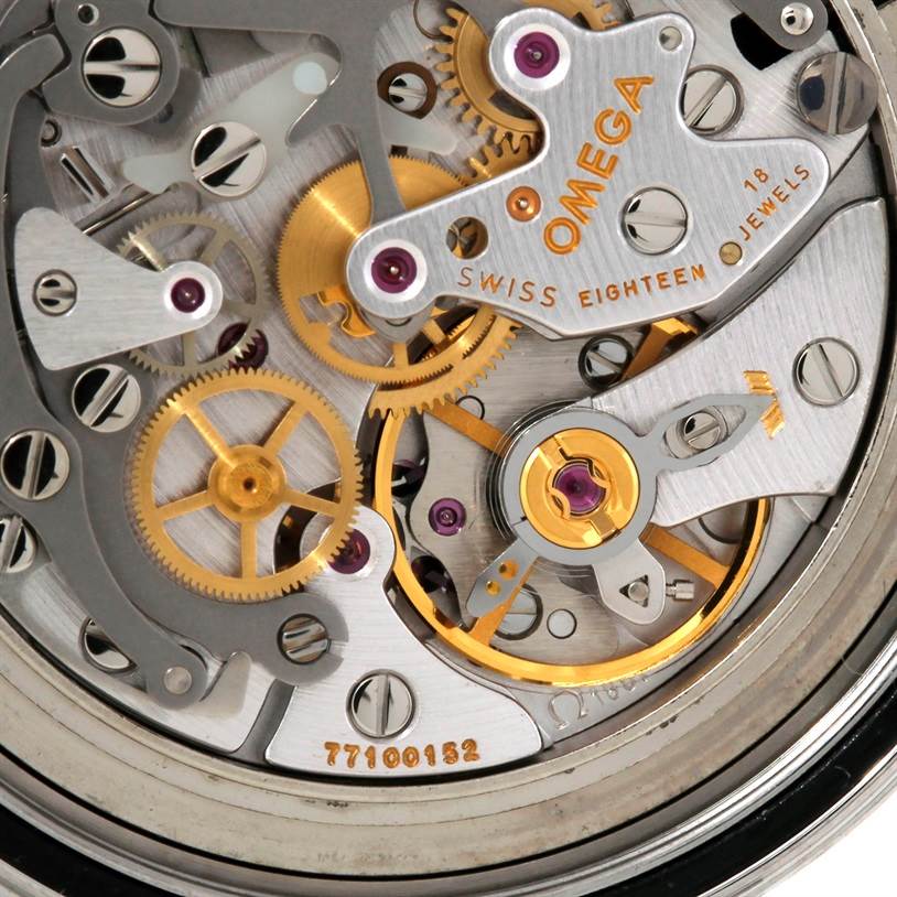 The image shows a close-up view of the movement and internal mechanics of an Omega Speedmaster 3574.51.00 Men's Stainless Steel Black Dial 3574.51.00 Men's Stainless Steel Black Dial watch.