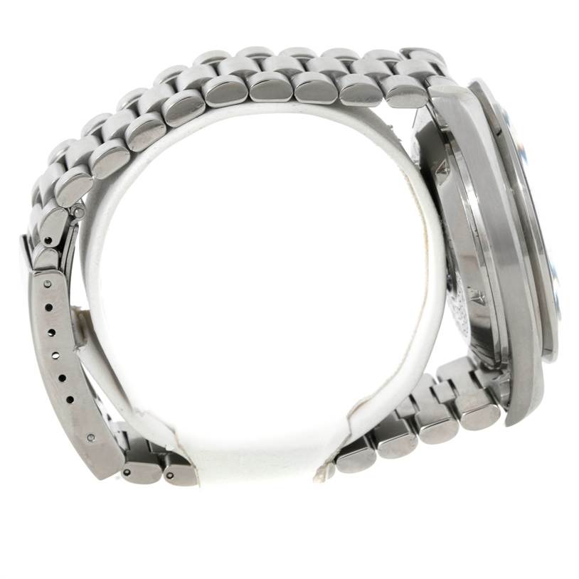 This side-angle view of the Omega Speedmaster Men's Stainless Steel Black Dial Men's Stainless Steel Black Dial watch shows the bracelet and case.