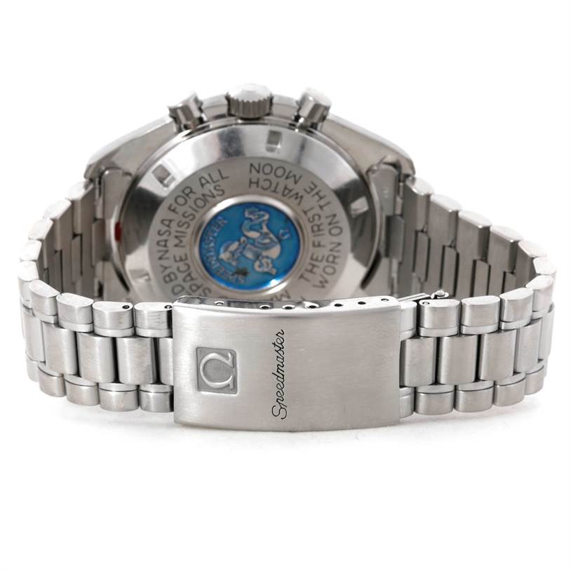 The image shows the back and clasp of an Omega Speedmaster Men's Stainless Steel Black Dial Men's Stainless Steel Black Dial watch, highlighting the engraved case back and stainless steel bracelet.