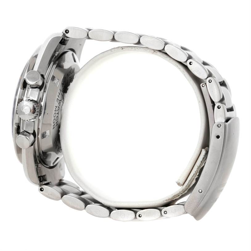 The image shows a side view of the Omega Speedmaster 3570.50.00 Men's Stainless Steel Black Dial 3570.50.00 Men's Stainless Steel Black Dial watch, highlighting the pushers, crown, and metal bracelet.