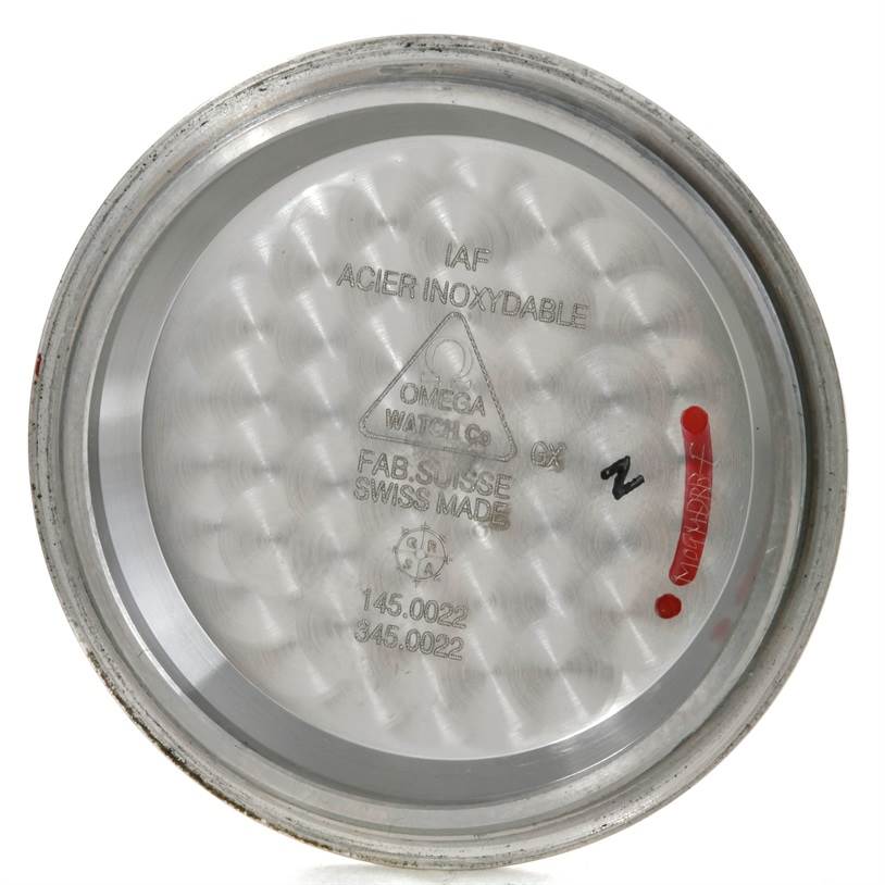 The image shows the inside of the case back cover of an Omega Speedmaster 3570.50.00 Men's Stainless Steel Black Dial 3570.50.00 Men's Stainless Steel Black Dial watch.