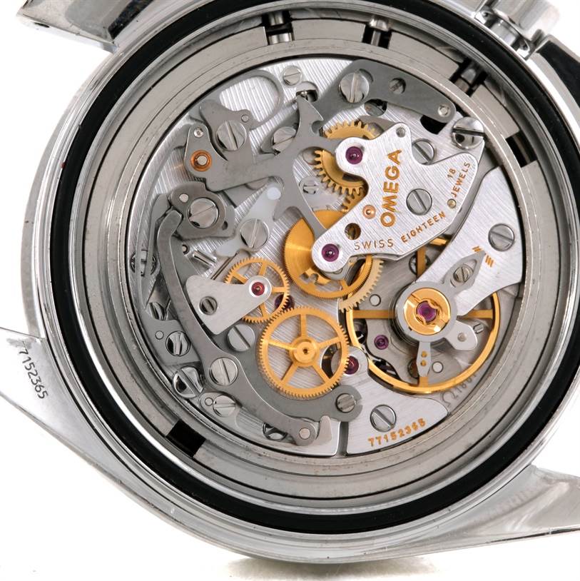 The image shows the intricate internal mechanism of the Omega Speedmaster 3570.50.00 Men's Stainless Steel Black Dial 3570.50.00 Men's Stainless Steel Black Dial watch from a rear, close-up angle with the case back removed.