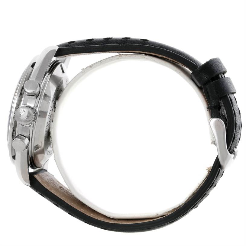 The image shows a side profile of an Omega Speedmaster 3570.50.00 Men's Stainless Steel Black Dial 3570.50.00 Men's Stainless Steel Black Dial watch highlighting the crown, pushers, and leather strap.