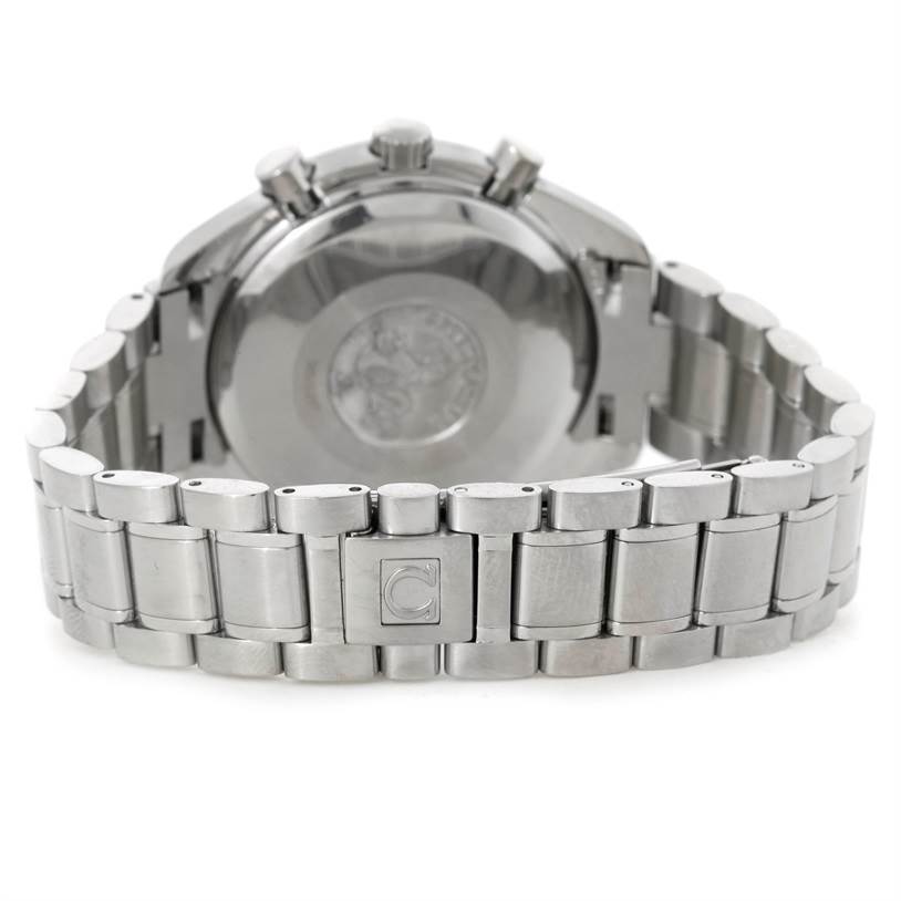 The image shows the back view of an Omega Speedmaster 3523.80.00 Men
s Stainless Steel Blue Dial 3523.80.00 Men
s Stainless Steel Blue Dial watch, highlighting the case back and the metal bracelet with the Omega logo.