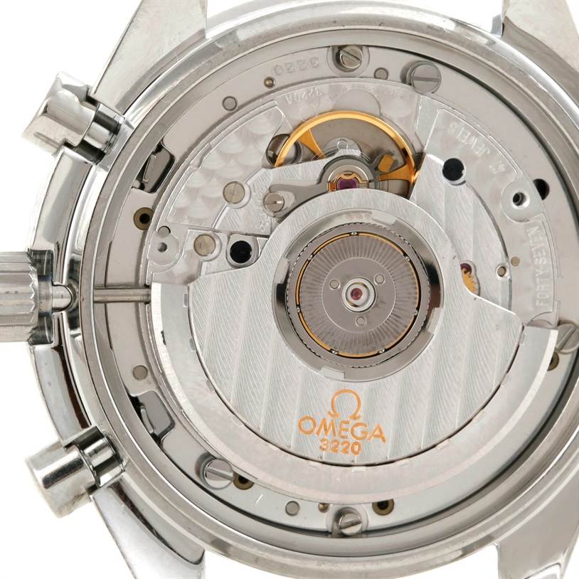 The image shows the movement mechanism of the Omega Speedmaster 3510.50.00 Men
s Stainless Steel Black Dial 3510.50.00 Men
s Stainless Steel Black Dial watch viewed from the back.