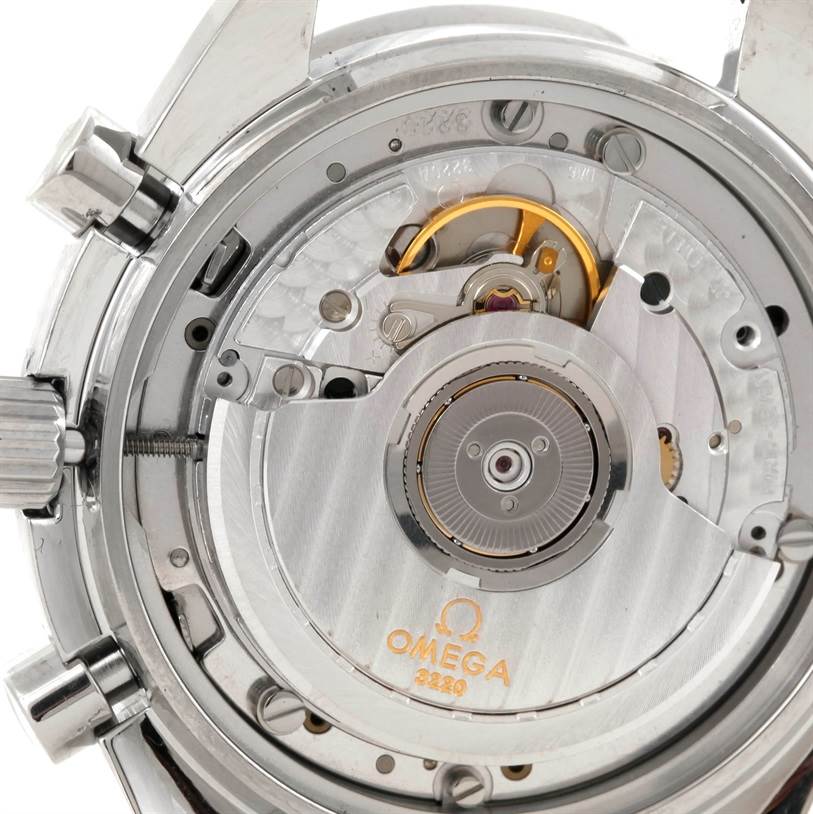 The image shows the caseback and intricate internal movement of an Omega Speedmaster 3510.50.00 Men
s Stainless Steel Black Dial 3510.50.00 Men
s Stainless Steel Black Dial watch.