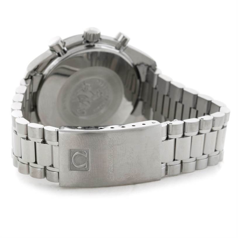 The image shows the back side of an Omega Speedmaster 3510.50.00 Men
s Stainless Steel Black Dial 3510.50.00 Men
s Stainless Steel Black Dial watch, focusing on the clasp and portion of the bracelet.