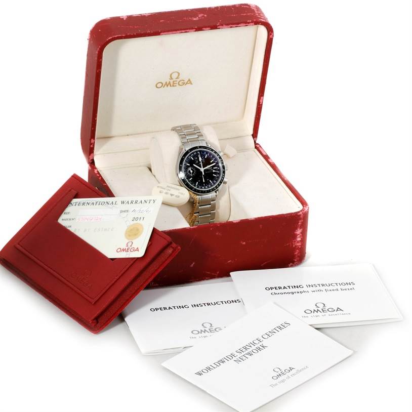 The Omega Speedmaster 3520.50.00 Men
s Stainless Steel Black Dial 3520.50.00 Men
s Stainless Steel Black Dial watch is shown in an open box with warranty card, red cardholder, and instruction booklets.